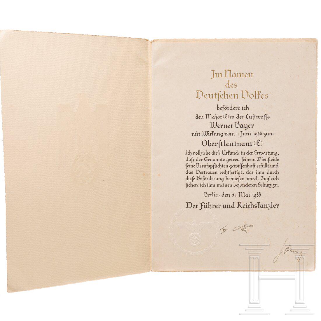 Adolf Hitler and Hermann GÃ¶ring - their handwritten ink signatures on an promotion certificate: Adolf Hitler and Hermann GÃ¶ring - their handwritten ink signatures on an promotion certificate Doppelblatt Ã¼ber die BefÃ¶rderung zum Oberstleutnant der Luftwaffe vom 01.06.38 mit BlindprÃ¤ge