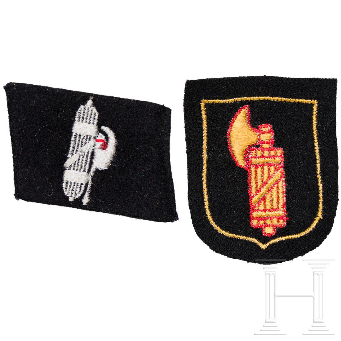 A right hand collar tab and sleeve shield for members of the 29th Waffen-Grenadier-Division of the: A right hand collar tab and sleeve shield for members of the 29th Waffen-Grenadier-Division of the SS (Italien No. 1)Darauf ein LiktorenbÃ¼ndel in heller silbergrauer RZM-Stickerei auf feinem schwar