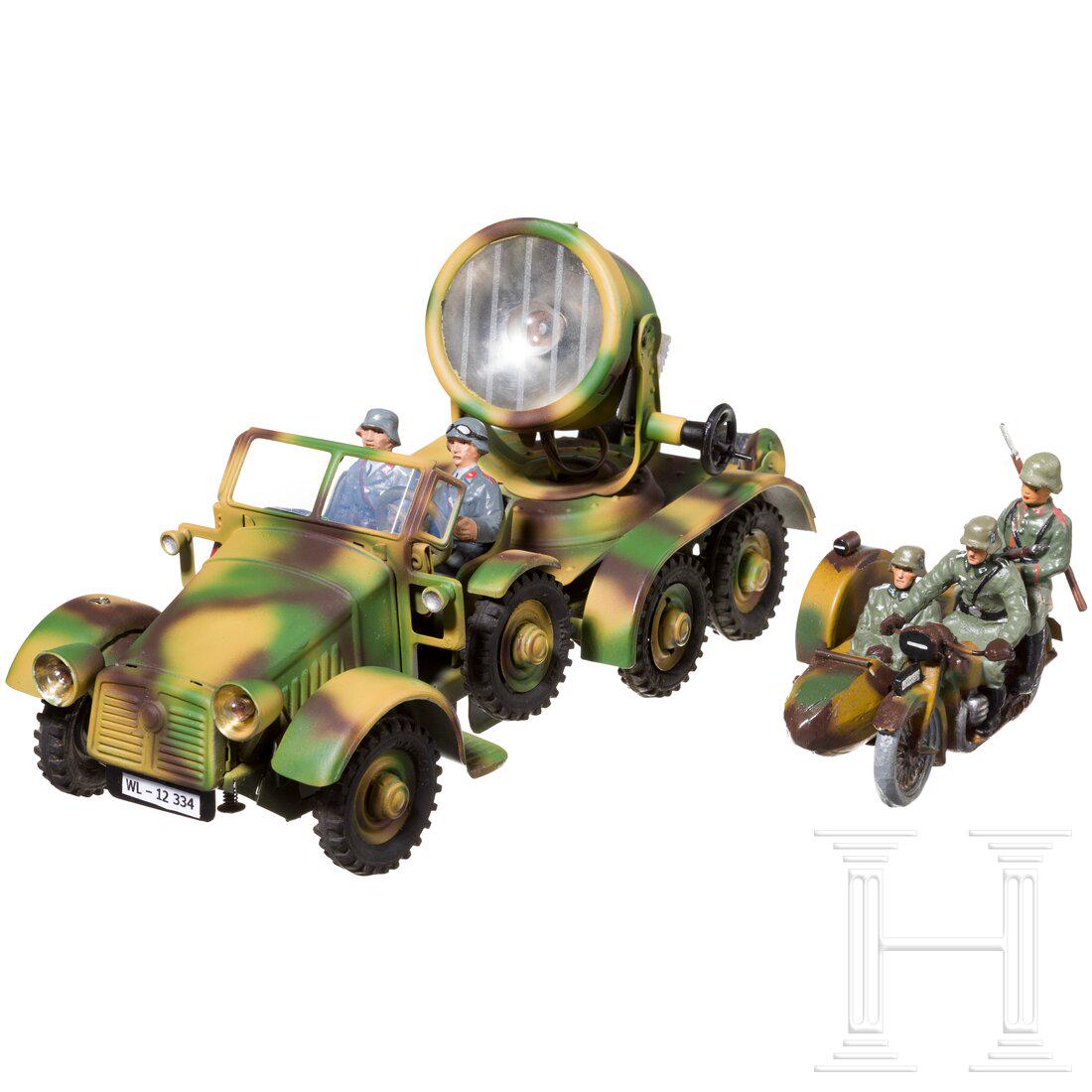 A Hausser Krupp searchlight car with two Flak soldiers and a motorcycle with sidecar: A Hausser Krupp searchlight car with two Flak soldiers and a motorcycle with sidecarHausser, Blech-MasseausfÃ¼hrung, 30er/80er Jahre, 7 cm-Serie. Ein Krupp-Scheinwerferauto, Gummireifen, Uhrwerk feh
