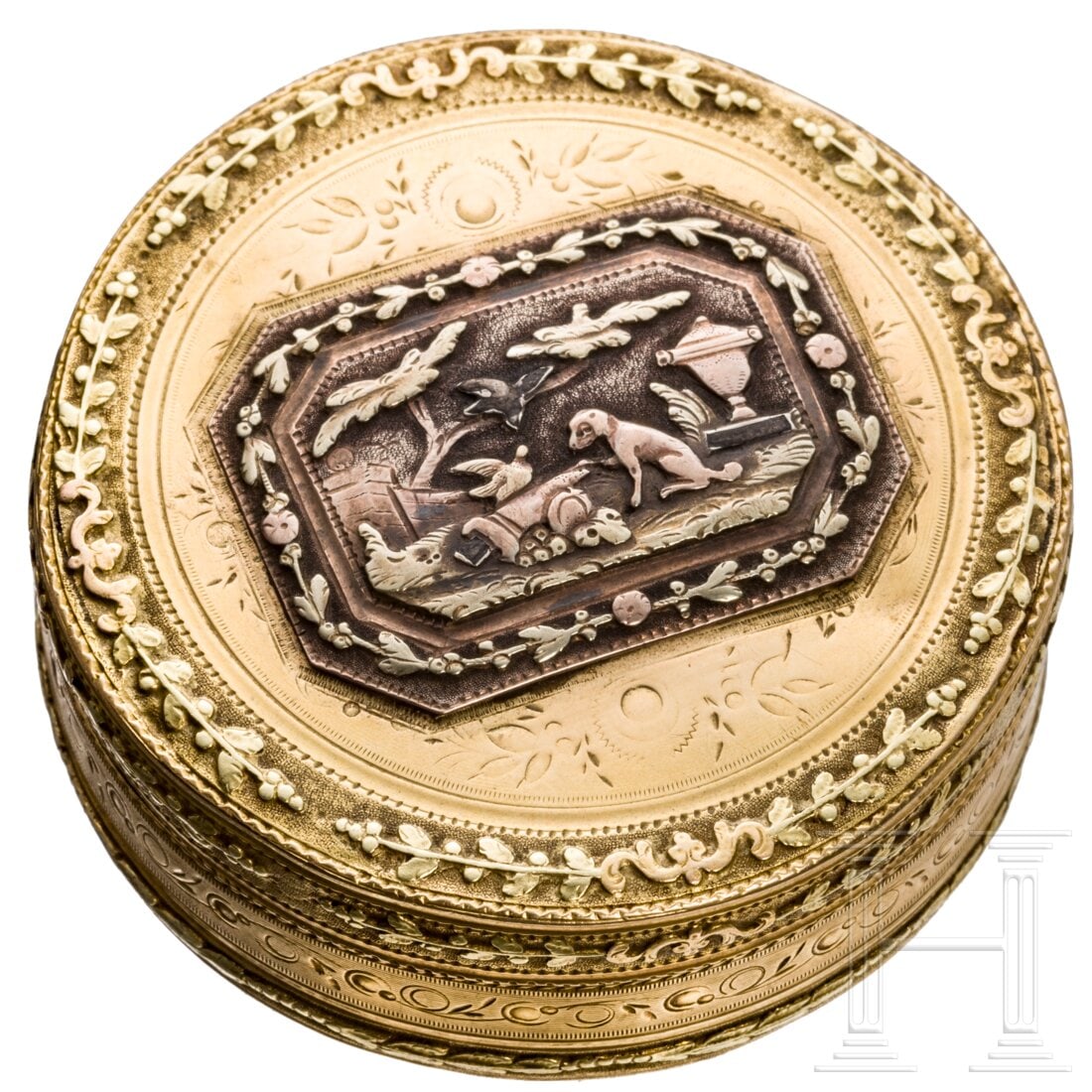 A French gold pill box, circa 1750: A French gold pill box, circa 175018ct gold (tested). Round, lidded box with fine guilloched decoration all-over and continuous tendril ornaments in relief at the edges. En suite worked lid, in the ce