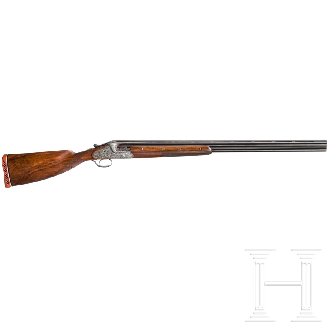 An over-and-under shotgun Merkel 303 E: An over-and-under shotgun Merkel 303 ECal. 12/70, SN. 43904, barrel length 76 cm, bright bores. Wide needle-etched barrel bar. The breech end of the barrel set engraved. Valid proof marks dated 1956. 
