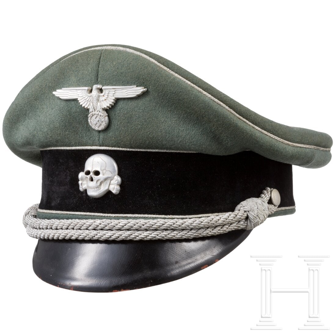 A visor cap for commanders of the Waffen SS holding the rank of general: A visor cap for commanders of the Waffen SS holding the rank of generalFine, field-grey cloth with black velvet trim (with replaced paper reinforcement) and silver piping. The lining of artificial sil