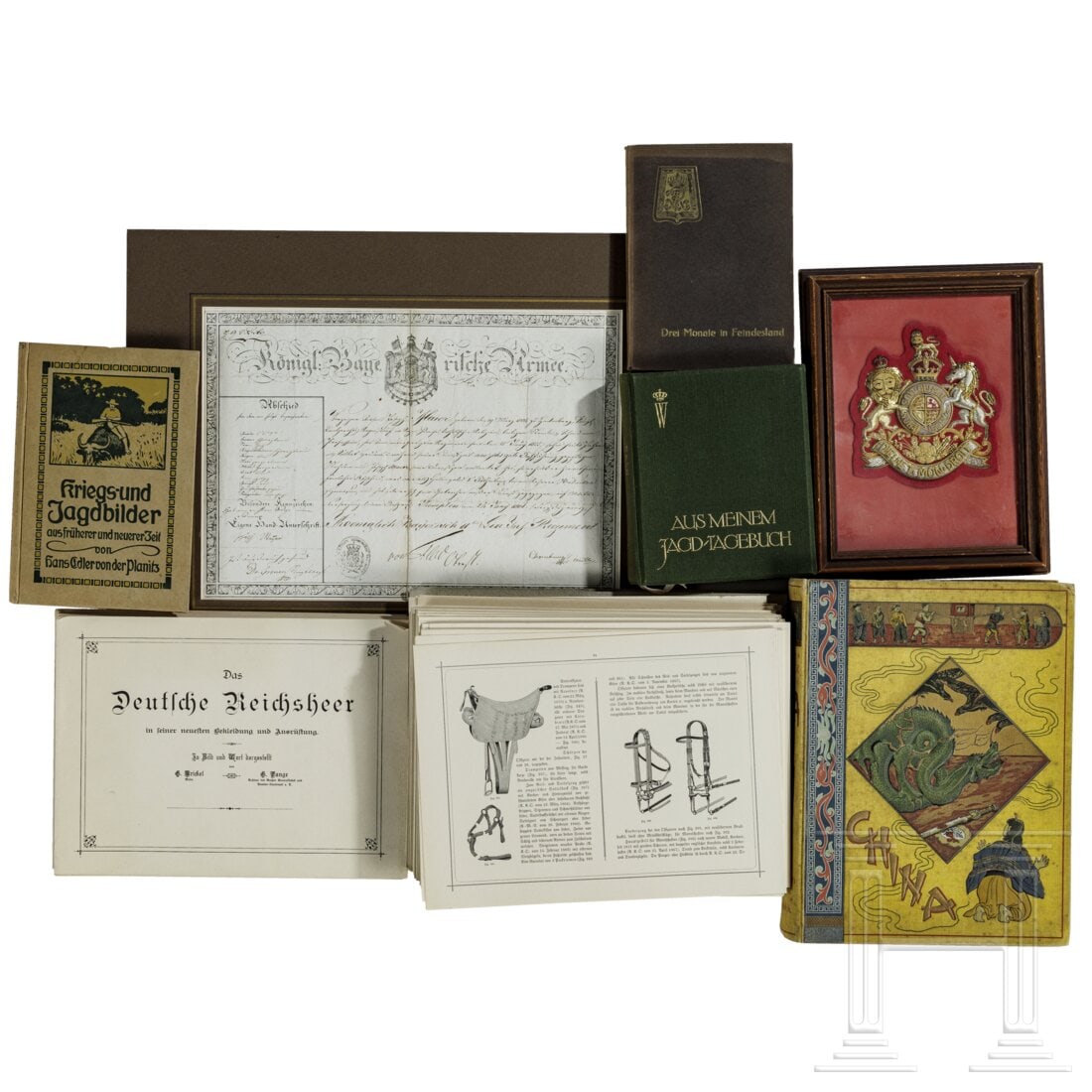 A collection of books, a military document and a coat of arms, 19th/20th century (1 of 6)