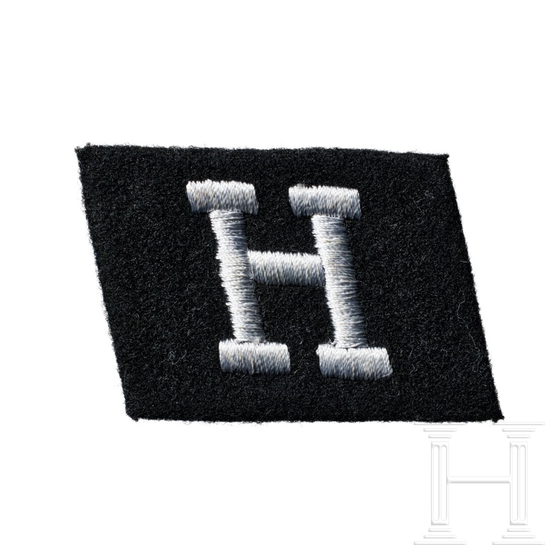 A Single Collar Tab for 25th Waffen Grenadier Division "Hunyadi", Enlisted: A Single Collar Tab for 25th Waffen Grenadier Division "Hunyadi", EnlistedBlack cloth backing, right tab with silver-grey machine-embroidered "H". USA lot - more info hereCondition: II