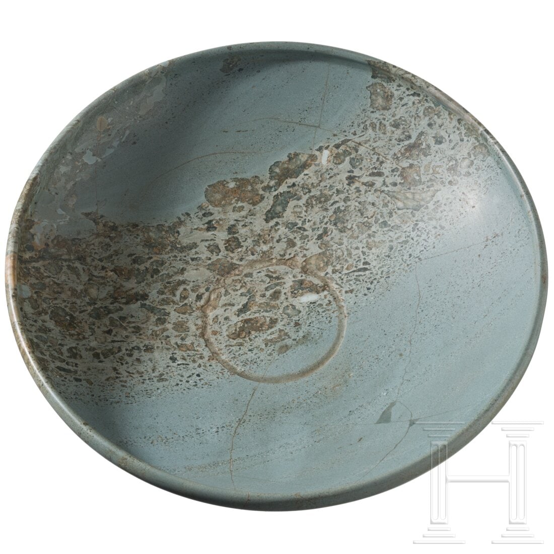 An ancient Egyptian Greywacke bowl, later 2nd Dynasty, circa 2750 - 2649 B.C.: An ancient Egyptian Greywacke bowl, later 2nd Dynasty, circa 2750 - 2649 B.C.Elegantly shaped and precisely ground bowl with a flat base, a flat, conical upward wall and a slightly indented edge. A st