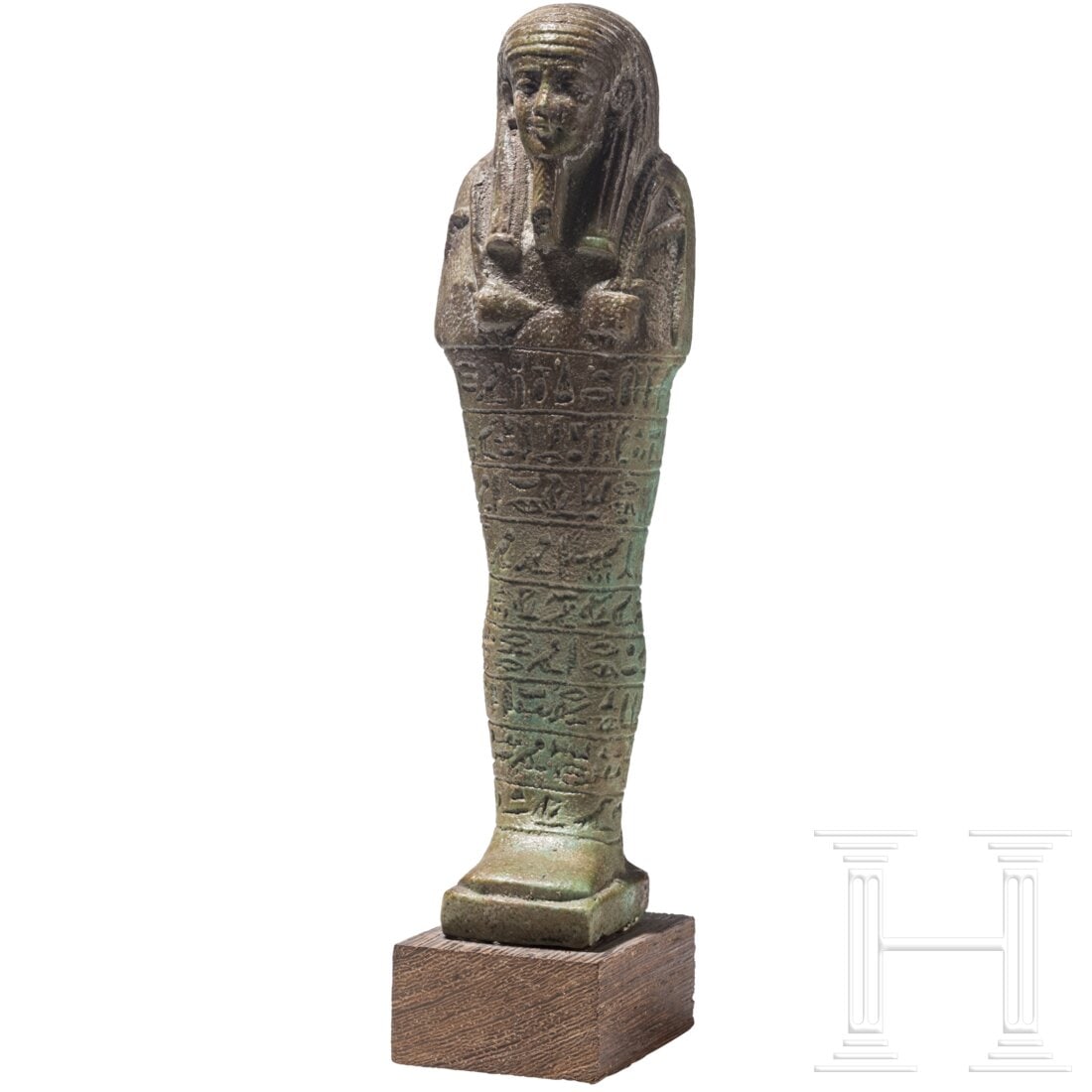 A faience ushabti with nine-line hieroglyphic inscription, 26th Dynasty (Saite Period), mid-1st (1 of 5)