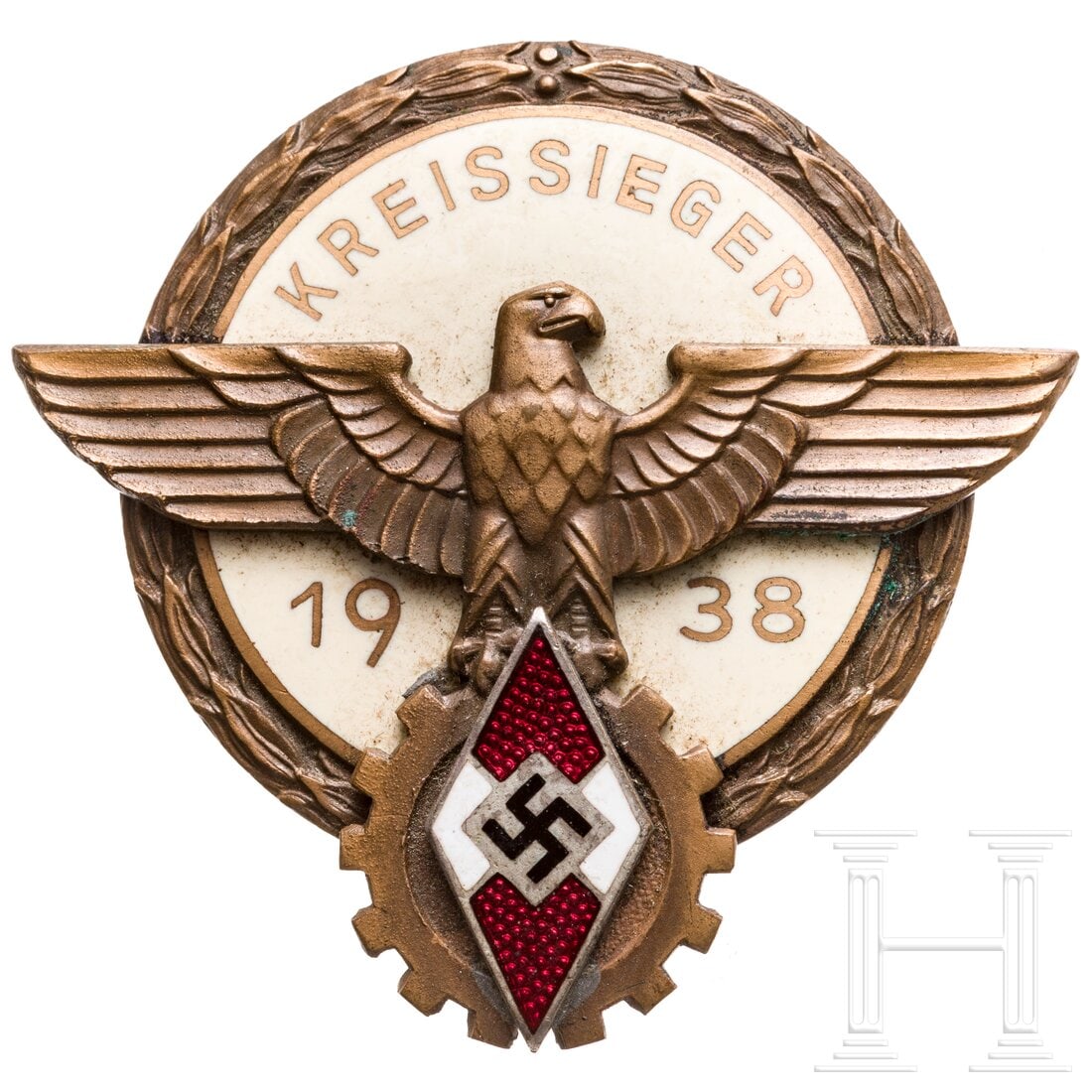 A Kreissieger badge for the National Trade Competition 1938: A Kreissieger badge for the National Trade Competition 1938Bronziertes, teilemailliertes Buntmetallabzeichen des Herstellers "G. Brehmer Markneukirchen". Unbeschädigt.Condition: II +