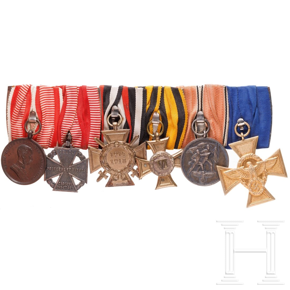 A six-piece medal bar of an Austrian police officer: A six-piece medal bar of an Austrian police officerMit der österreichischen Tapferkeitsmedaille (FJ 1), dem Karl-Truppenkreuz und der DA für 6 Jahre sowie dem Deutschen FEK, der Medaille 13.03.38 un