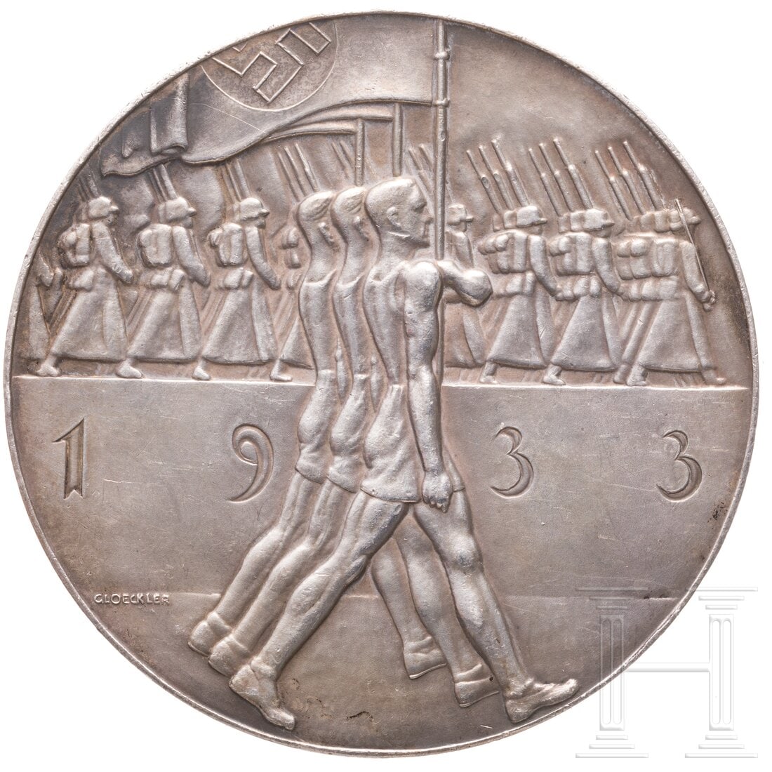 A silver winner's medal from the German sports authority 1933: A silver winner's medal from the German sports authority 1933Runde silberne Medaille mit vorderseitig reliefierter Darstellung eines fahnentragenden Athleten vor marschierenden Soldaten sowie Künstle
