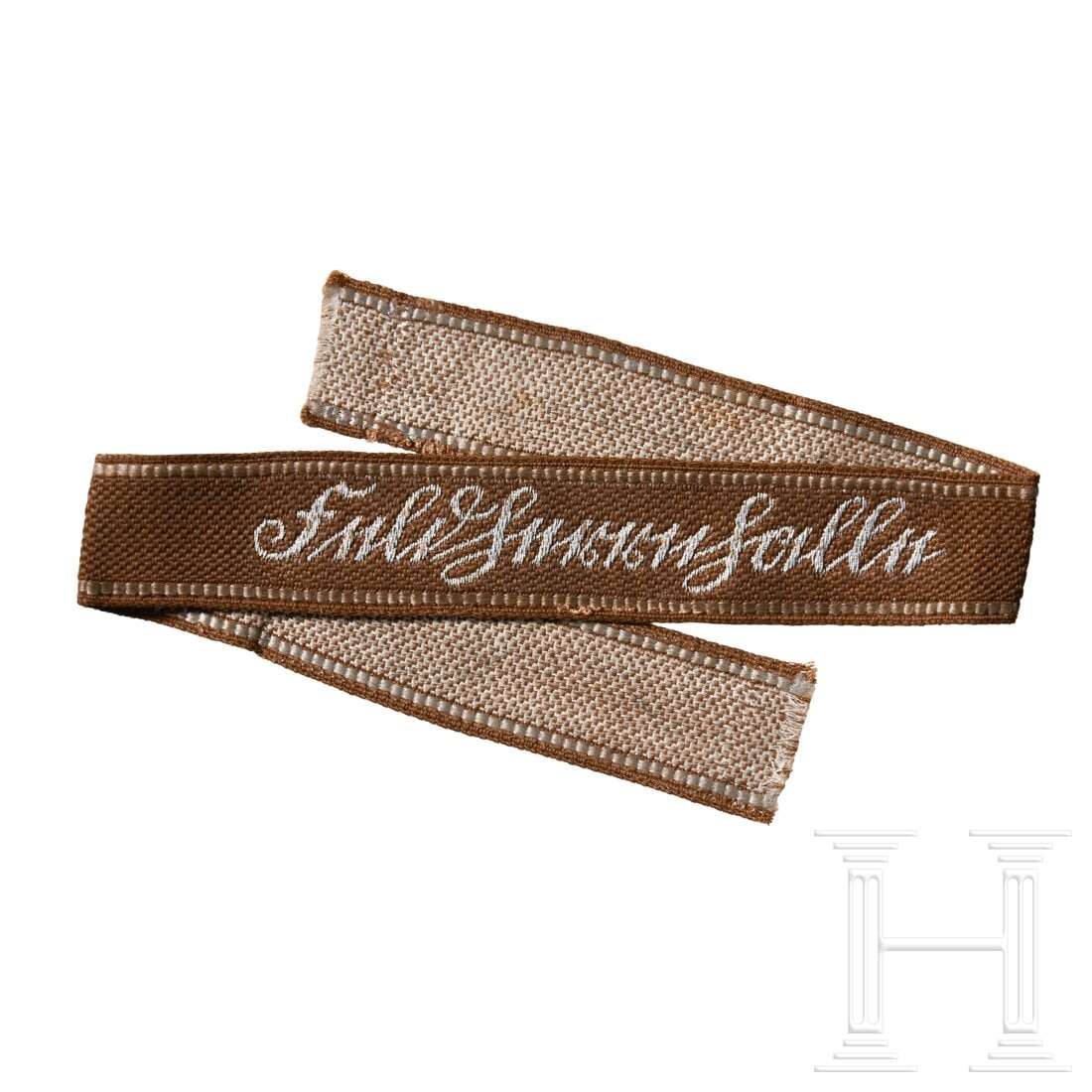An officer's cuff title 60th Panzer Grenadier Division “Feldherrnhalle: An officer's cuff title 60th Panzer Grenadier Division “Feldherrnhalle”Machine woven, tan rayon construction with a repeating, interwoven, waffle pattern and machine, "BeVo", woven, Sütterlin