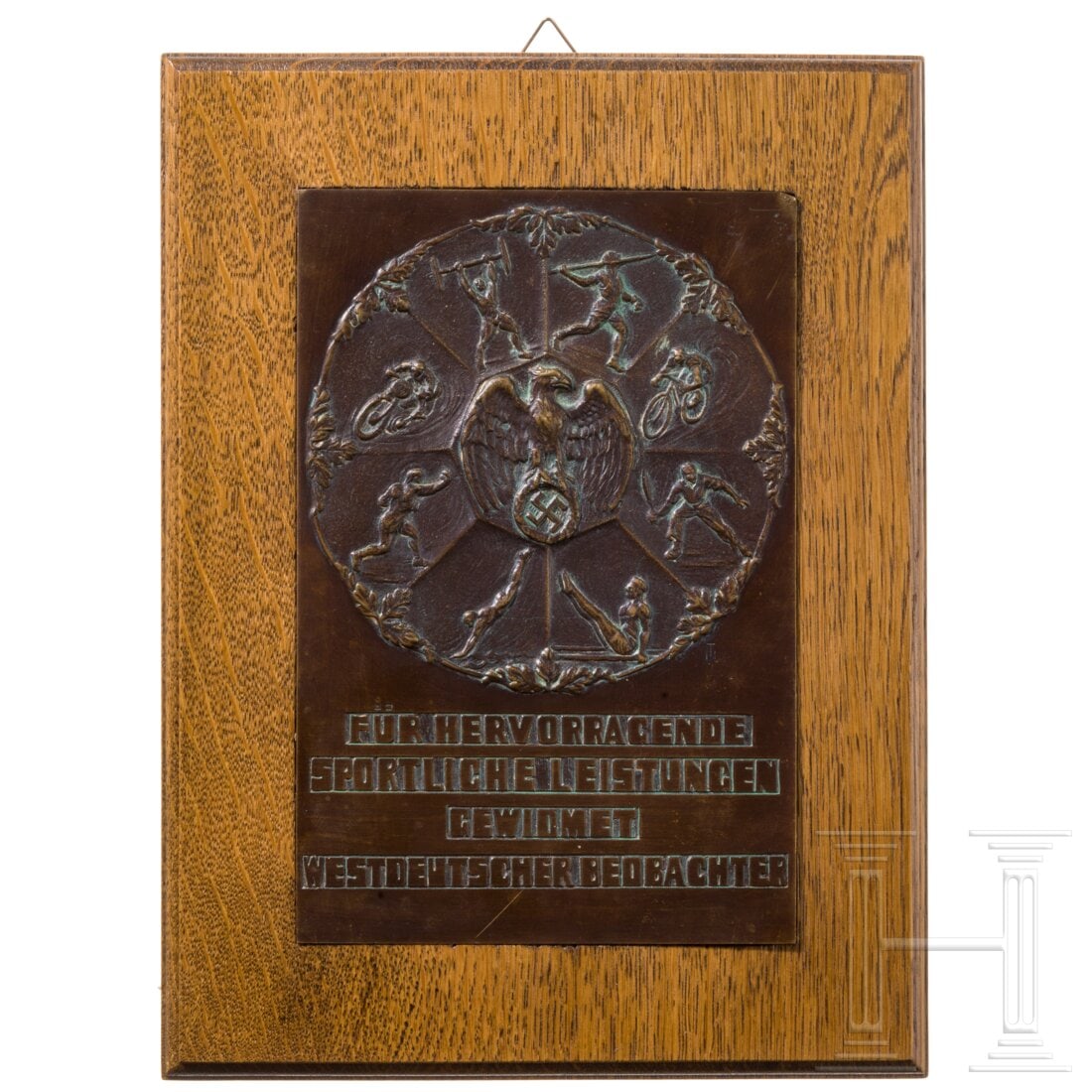 A bronze plaque "Dedicated for outstanding sporting achievements - West German Observer": A bronze plaque "Dedicated for outstanding sporting achievements - West German Observer"Rechteckige Bronzeplakette, auf den oberen 2/3 ein reliefierter Hoheitsadler umgeben von den Darstellungen der S