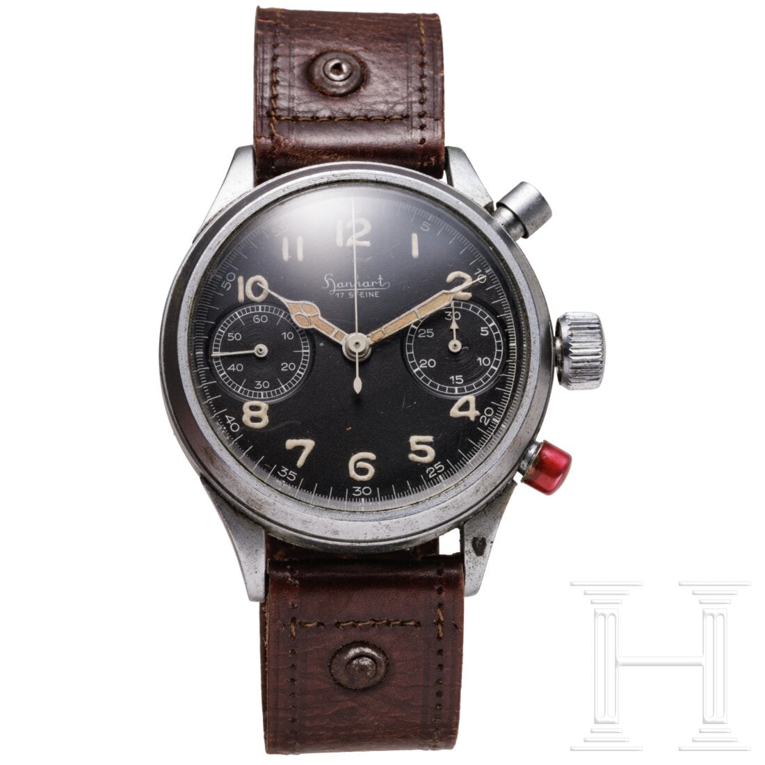An aviator's chronograph of the German Luftwaffe made by Hanhart: An aviator's chronograph of the German Luftwaffe made by HanhartGehäuse mit zwei Drückern. Schwarzes Ziffernblatt mit Leuchtziffern und -zeigern, kleiner Sekunde auf der "9", Firmenbezeichnung "Hanh