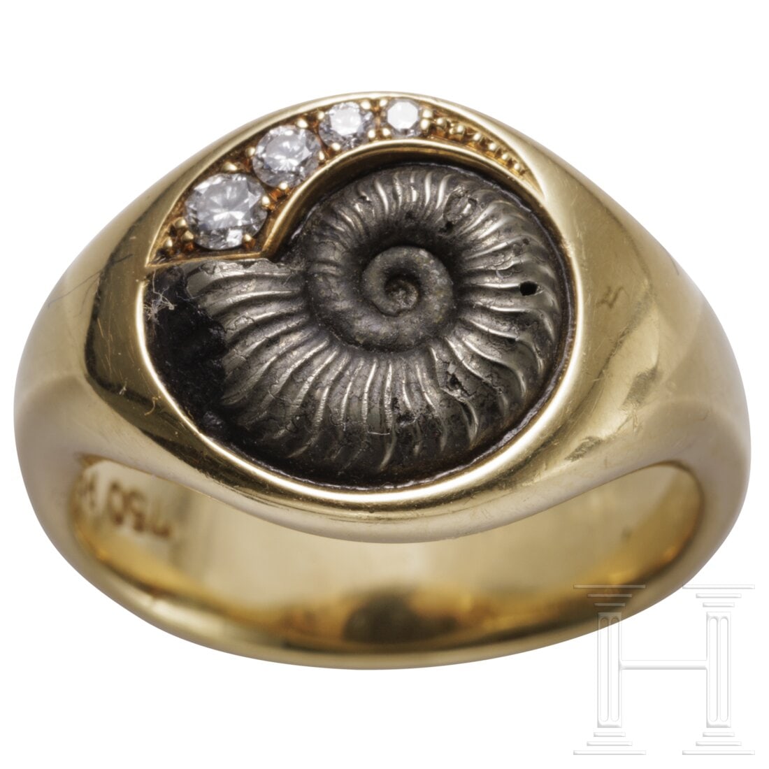 A gold and ammonite ring with diamonds (1 of 3)