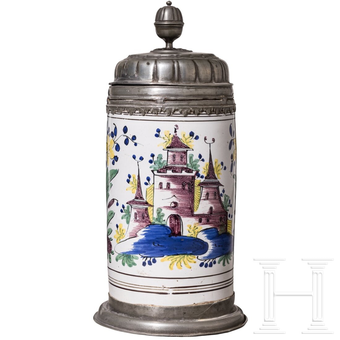 A pewter-mounted faience tankard with architectual setting, Dorotheenthal, circa 1730: A pewter-mounted faience tankard with architectual setting, Dorotheenthal, circa 1730Fayence, Zinnmontierung. Minimal gewölbte Wandung in bunten Scharffeuerfarben bemalt: reich bepflanzte Architektur