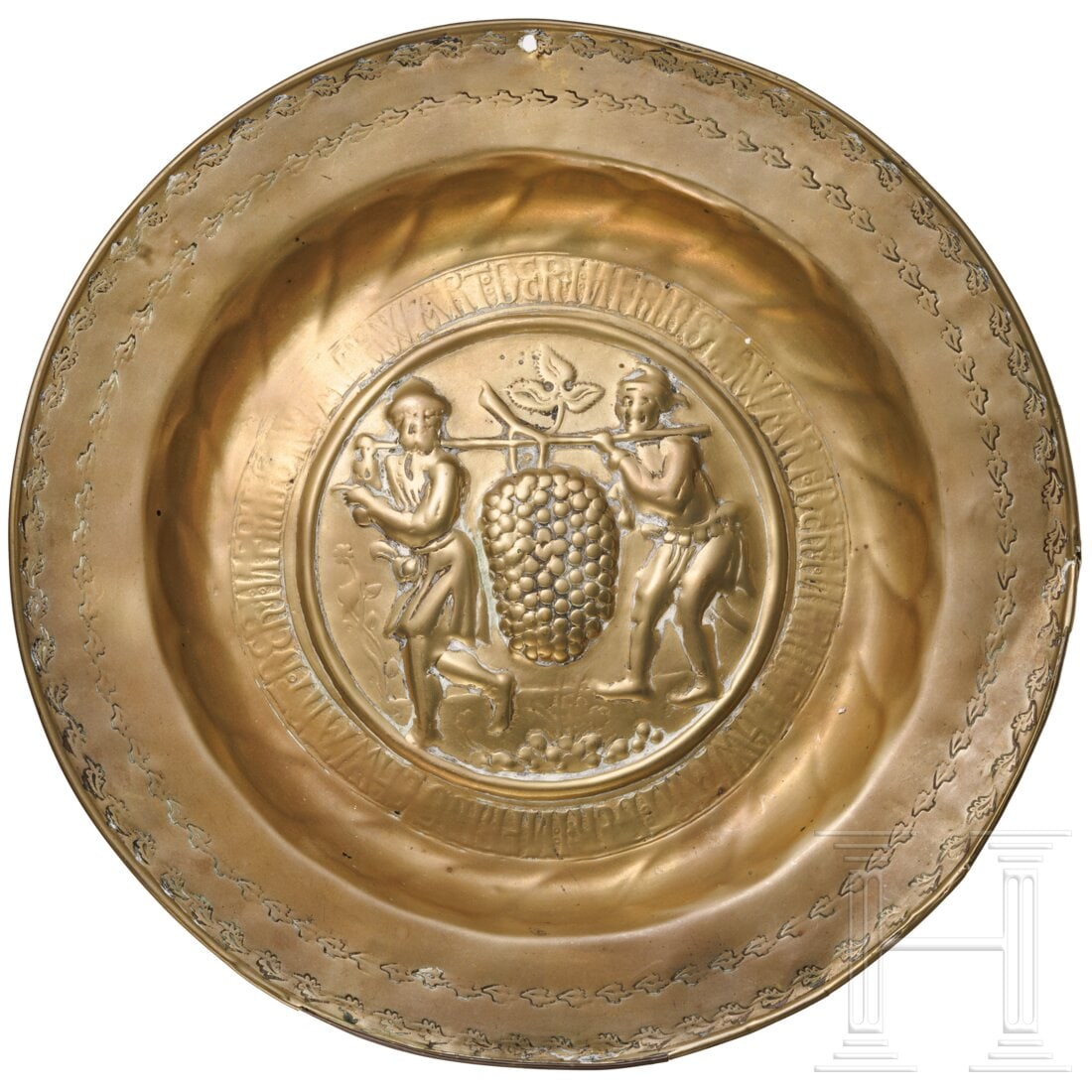 A brass alms dish showing Joshua and Caleb, Nuremberg, 16th century (1 of 2)