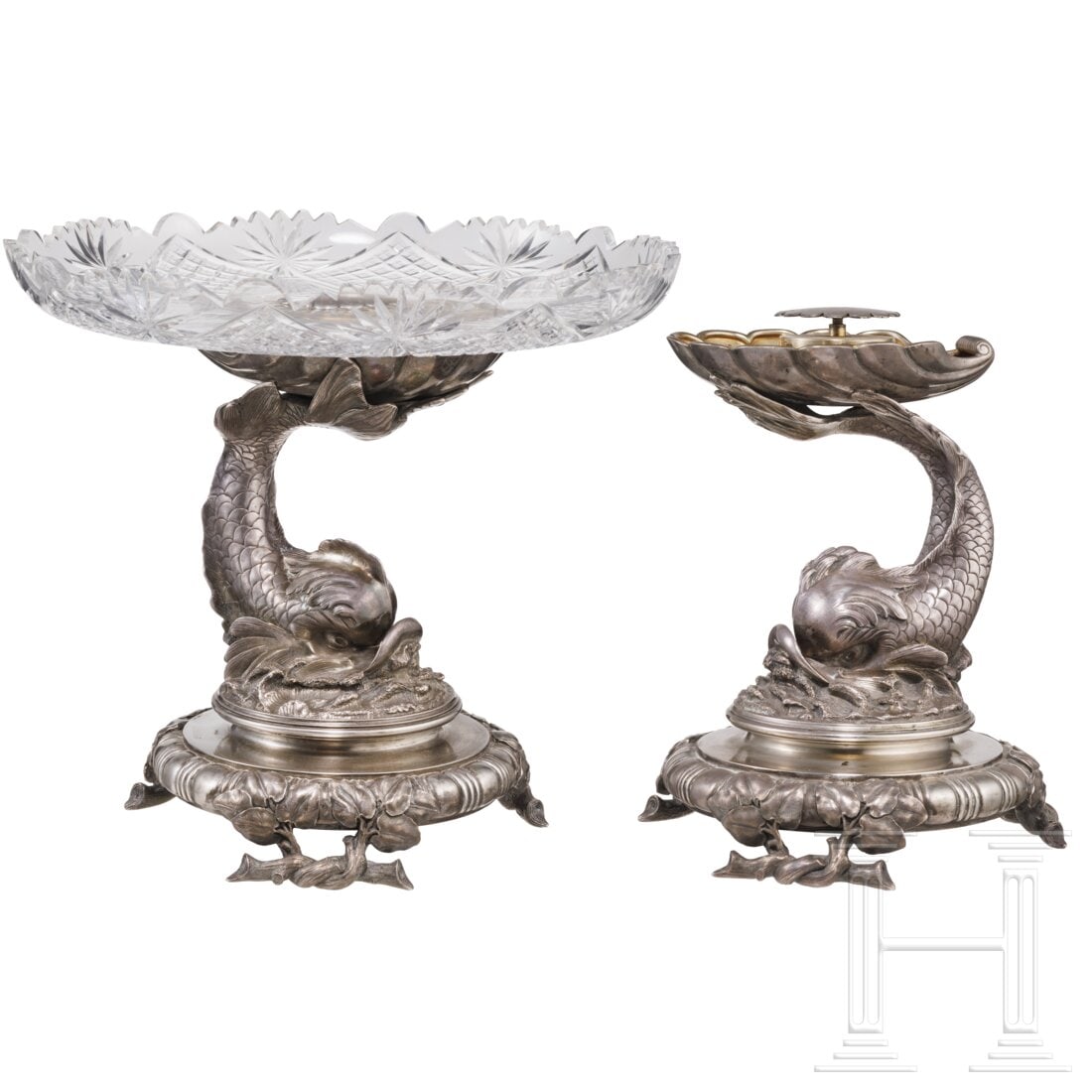 Two Russian silver tazzas (centerpieces), St. Petersburg, Grachev brothers, circa 1890: Two Russian silver tazzas (centerpieces), St. Petersburg, Grachev brothers, circa 1890Part-gilt silver. Either piece resting on three feet of intertwined, leafed branches. Stem in the form of a dolphi