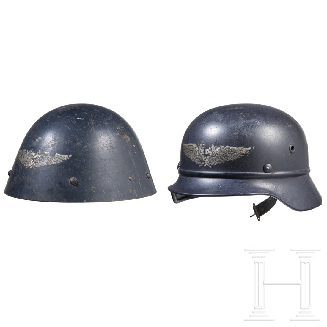 Two Reichsluftschutzbund steel helmets: Two Reichsluftschutzbund steel helmetsReichsluftschutzbund-Stahlhelm M35, orig. Lackierung, die Luftschutzschwinge vorne zu 90 % erhalten, innen gestempelt, das Innenfutter unvollständig, mit Kinnrie