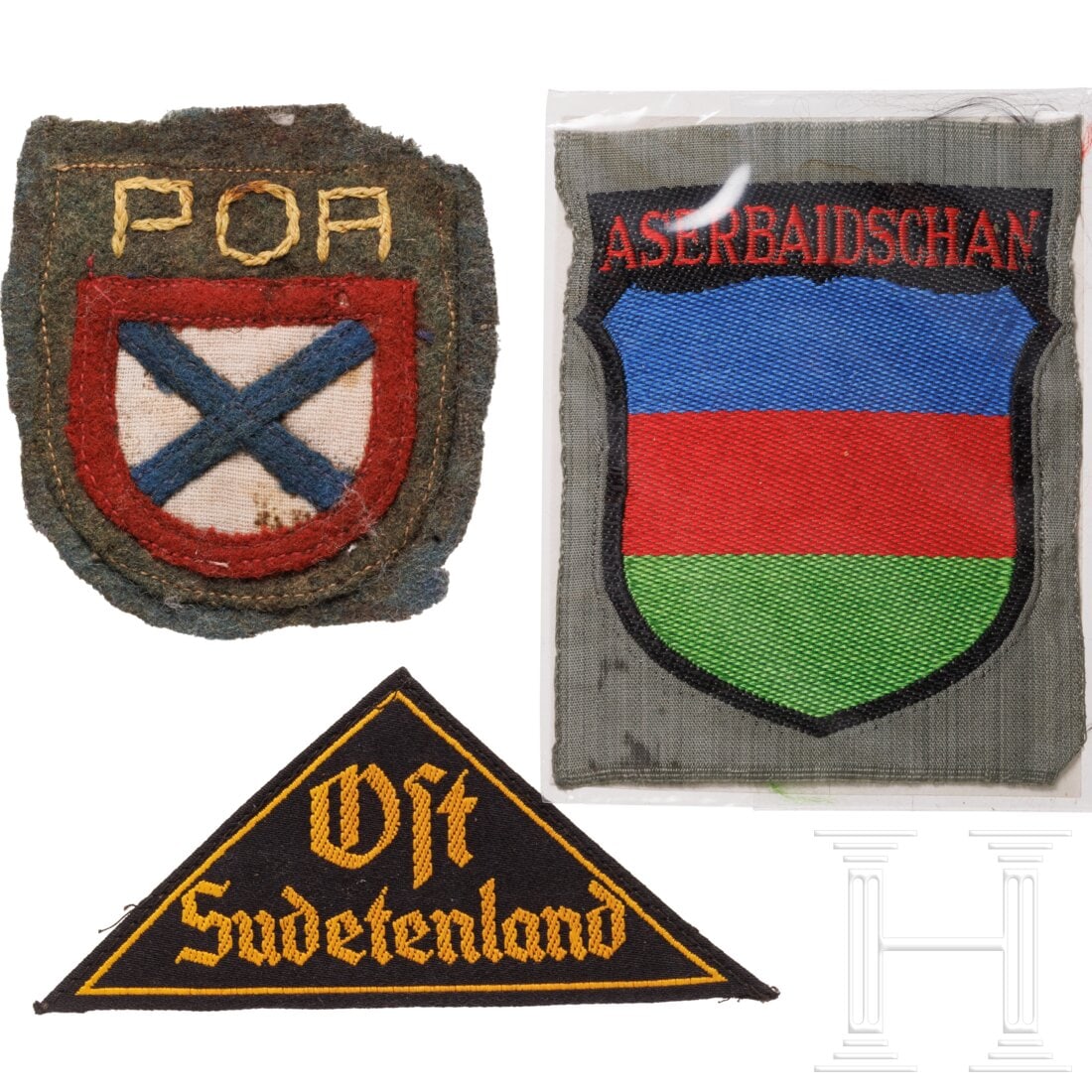 A small group of cloth insignia: A small group of cloth insigniaEin Ärmelabzeichen für aserbaidschanische Freiwillige in BeVo-Ausführung und ein HJ-Gebietsdreieck "Ost Sudentenland". Dazu eine Replik des Ärmelabzeichens für Ange