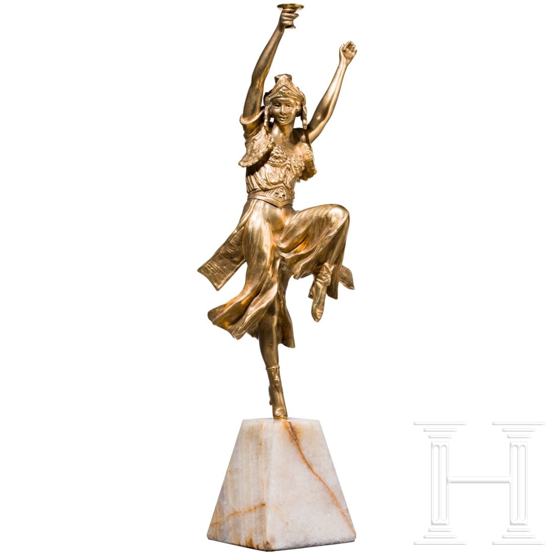 A fire-gilt bronze figure showing a female dancer, circa 1920: A fire-gilt bronze figure showing a female dancer, circa 1920Bronze, feuervergoldet. Auf einem trapezförmigen Steinsockel montierte, im Stil des Art Deco gekleidete Tänzerin. Sie steht auf einem Bei