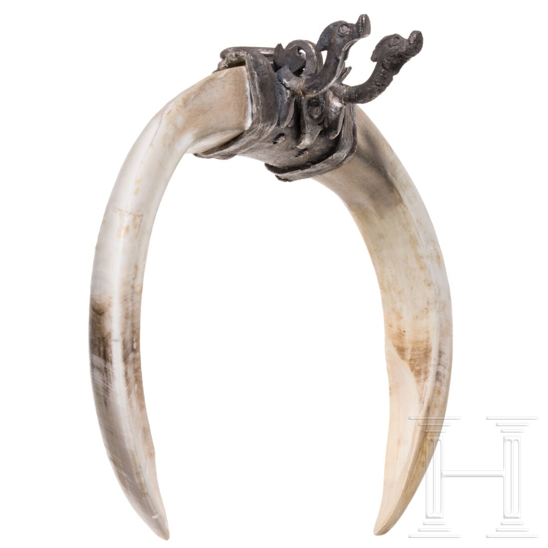 A late Roman silver pendant with two dolphins, circa 400 A.D.: A late Roman silver pendant with two dolphins, circa 400 A.D.The solid socket with decorative engraving on the front, the edges reinforced with rows of beads. A faceted ring eyelet attached to the top