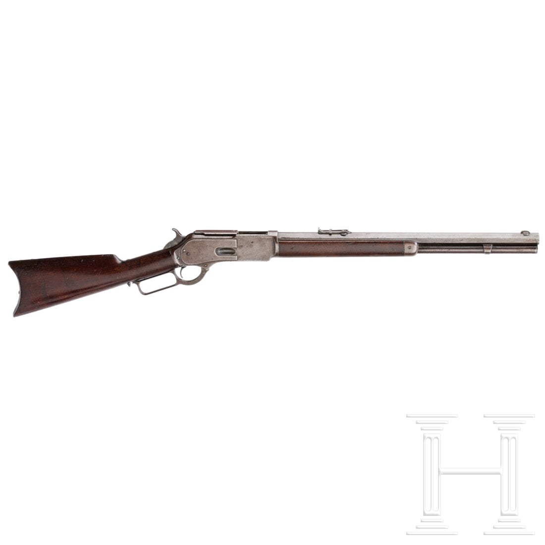 A Winchester Mod. 1876 Carbine: A Winchester Mod. 1876 CarbineCal. .45-60WCF, SN. 22273 , Oktagonallauf matt. Lauflänge 20". Fertigung 1882. Röhrenmagazin. Klappvisier. Zubringer aus Messing. Alle Teile vollständig gebläut, ledi