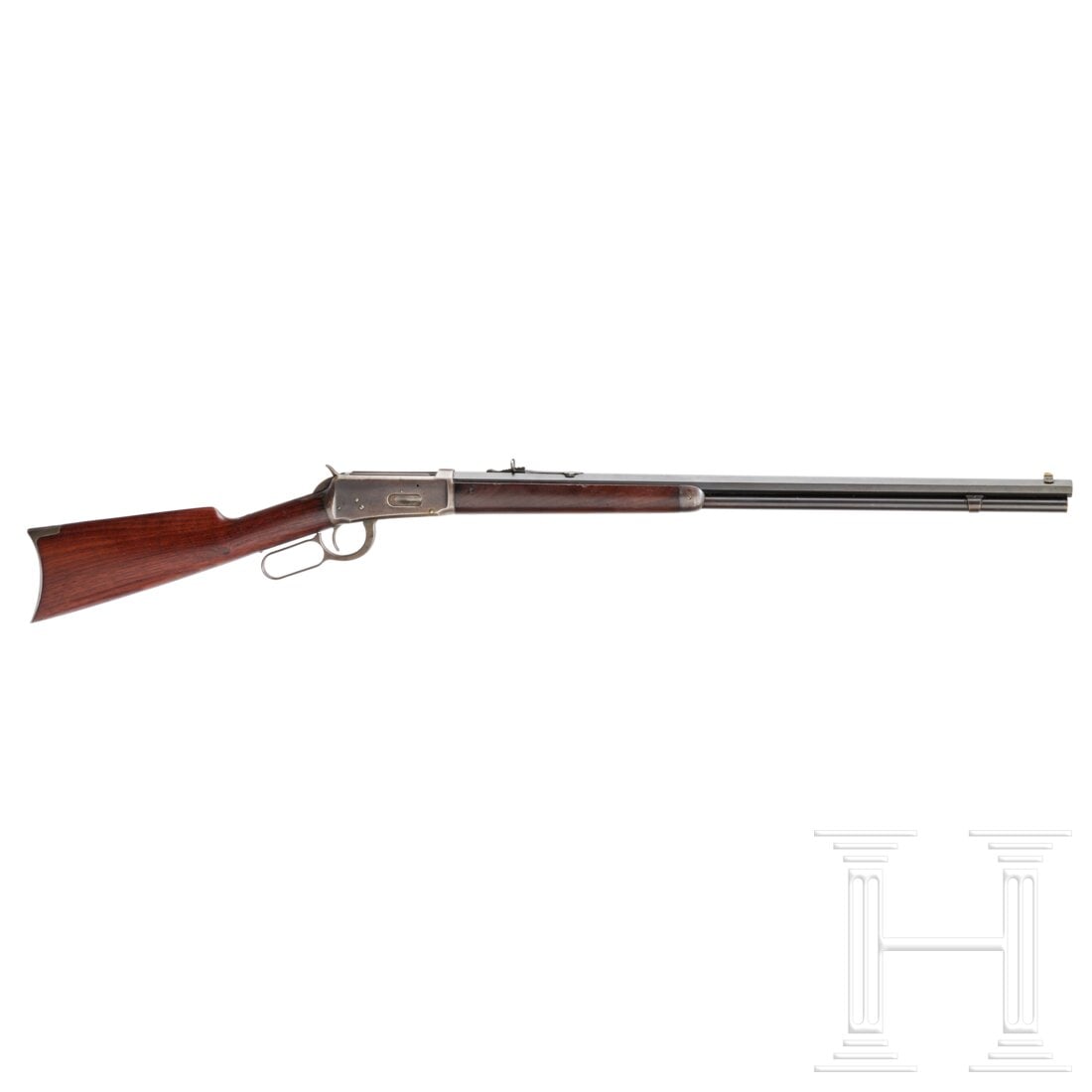 A Winchester Mod. 1894, 1895: A Winchester Mod. 1894, 1895Cal. .38-55Win, SN. 22192 , nummerngleich, blanker 26''-Oktagonallauf. Röhrenmagazin. Hergestellt 1895. Auf der Oberseite Firmierung und Patentdaten. Originale Brünierung