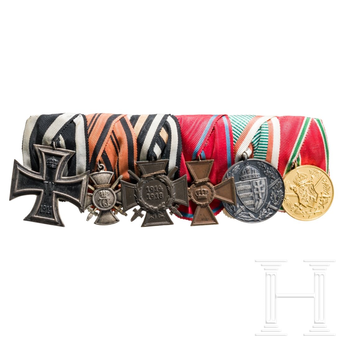 A large medal bar with 6 pieces: A large medal bar with 6 piecesSauber gebundene Ordensschnalle mit sechs Auszeichnungen eines württembergischen Soldaten:1. Eisernes Kreuz 2. Klasse 19142. Württ. Verdienstkreuz mit Schwertern, herg