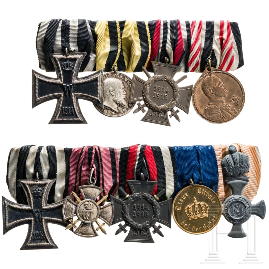 Two Württemberg medal bars: Two Württemberg medal barsEine fünfteilige Schnalle mit dem EK 2 von 1914, Verdienstkreuz mit Schwertern, FEK, DA für 12 Jahre und Eisernes Verdienstkreuz mit der Krone des Österreichischen Franz-