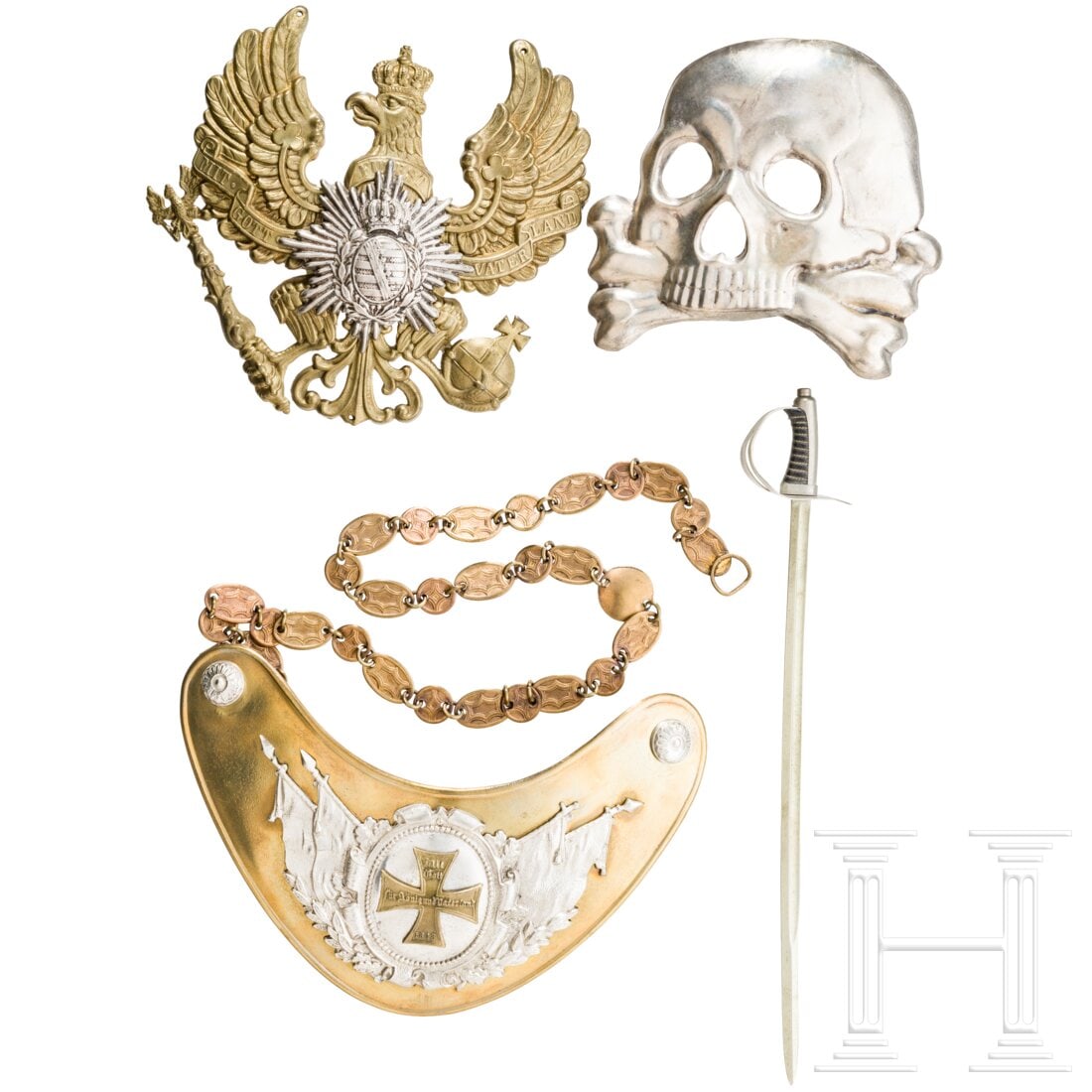 A collection of insignias and a letter opener, 20th century (1 of 2)