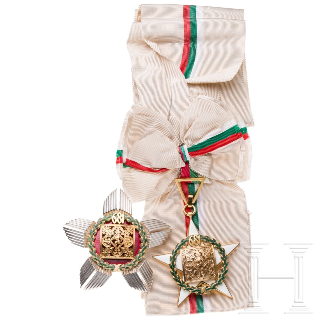 An Order of “13 Centuries of Bulgaria: An Order of “13 Centuries of Bulgaria”Gilt five-pointed sash badge, enamelled white on both sides, with a square coat of arms on the obverse, set within a green enamelled laurel wreath bearing
