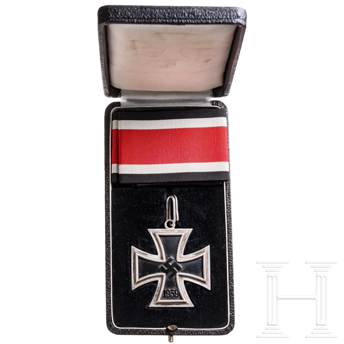 A cased Knight's Cross of the Iron Cross, made by Juncker of Berlin: A cased Knight's Cross of the Iron Cross, made by Juncker of BerlinEarly Juncker type. The black lacquered iron core in a silver frame with the typical embossed features. The frame stamped at the top 