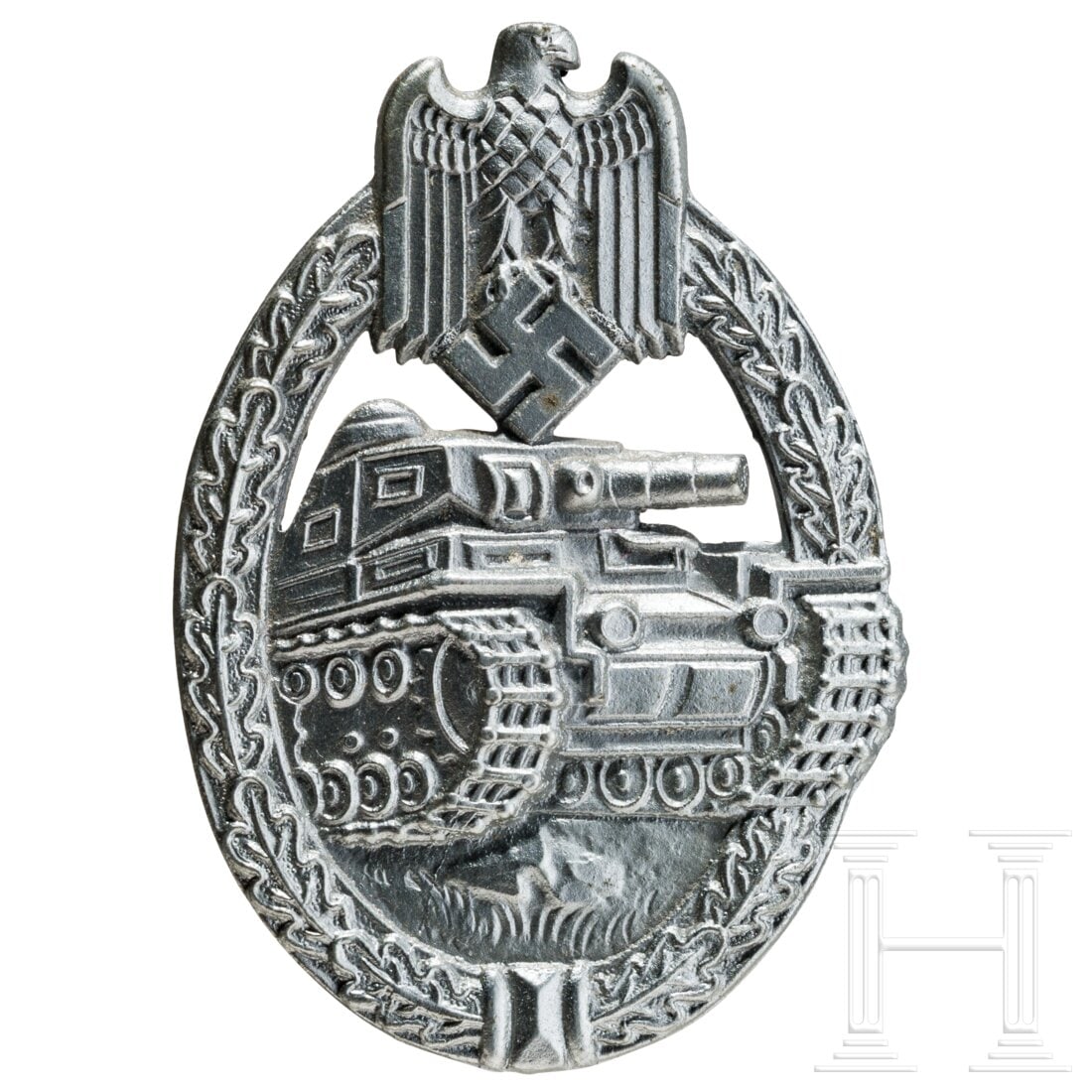 A Panzer Assault Badge in Silver made by Wiedmann, Frankfurt a. M.: A Panzer Assault Badge in Silver made by Wiedmann, Frankfurt a. M.Halbhohle versilberte Feinzinkausführung mit rs. vertikaler Drahtnadel und dem runden, punzierten Herstellerlogo für E. Ferdinand Wi