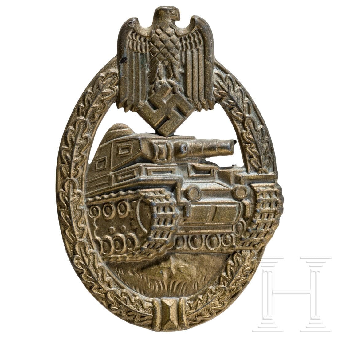 A Panzer Assault Badge in Bronze made by Wiedmann, Frankfurt a. M.: A Panzer Assault Badge in Bronze made by Wiedmann, Frankfurt a. M.Halbhohle bronzierte Feinzinkausführung mit rs. vertikaler Drahtnadel und dem runden, punzierten Herstellerlogo für E. Ferdinand Wie