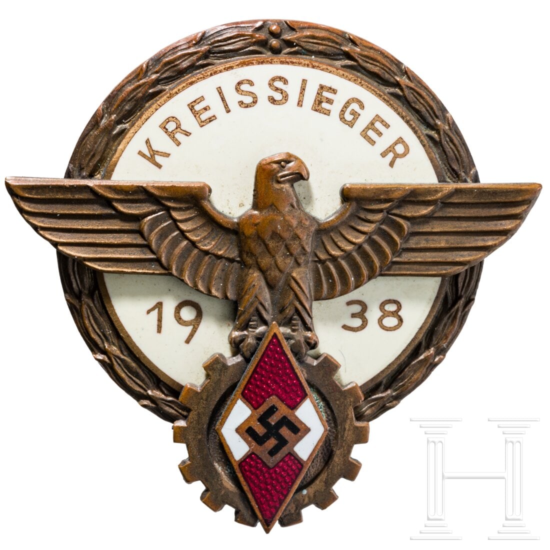 A 1938 Kreissieger badge for the Reichsberufswettkampf: A 1938 Kreissieger badge for the ReichsberufswettkampfBronziertes, teilemailliertes Buntmetallabzeichen mit separat aufgelegtem Adler und HJ-Raute (unbeschädigt), Hersteller "G. Brehmer