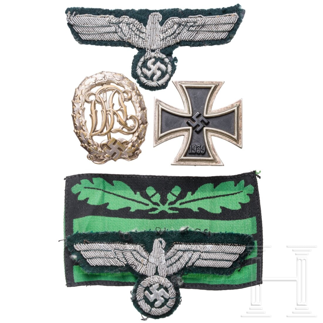An Iron Cross 1st class by Mebauer. Berlin, and cloth insignia (1 of 2)