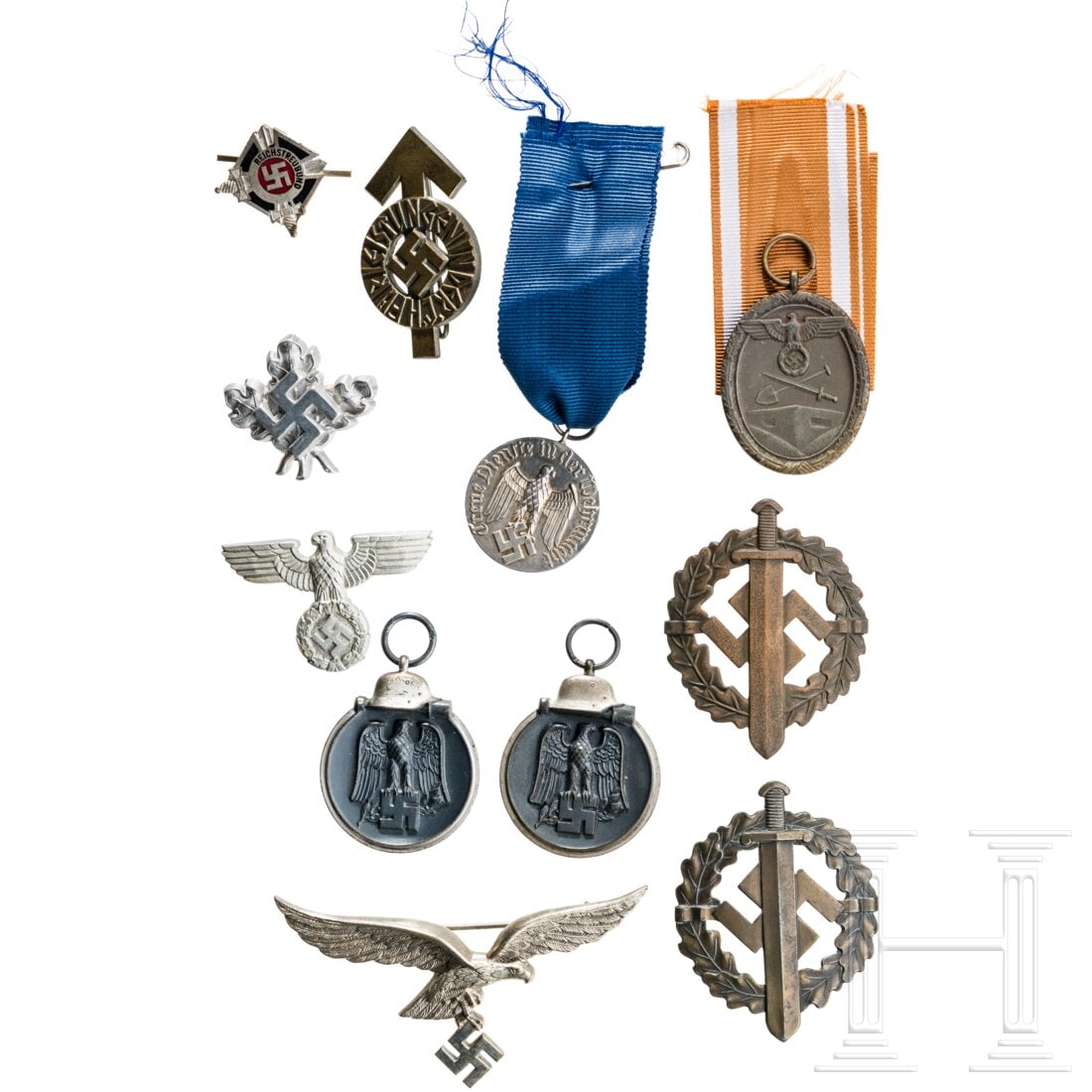 A small group of orders and badges: A small group of orders and badgesZwei SA-Sportabzeichen in Bronze, zwei Ostmedaillen, HJ-Leistungsabzeichen Bronze, DA der Wehrmacht für 4 Jahre, drei Mützenabzeichen und ein Brustadler der