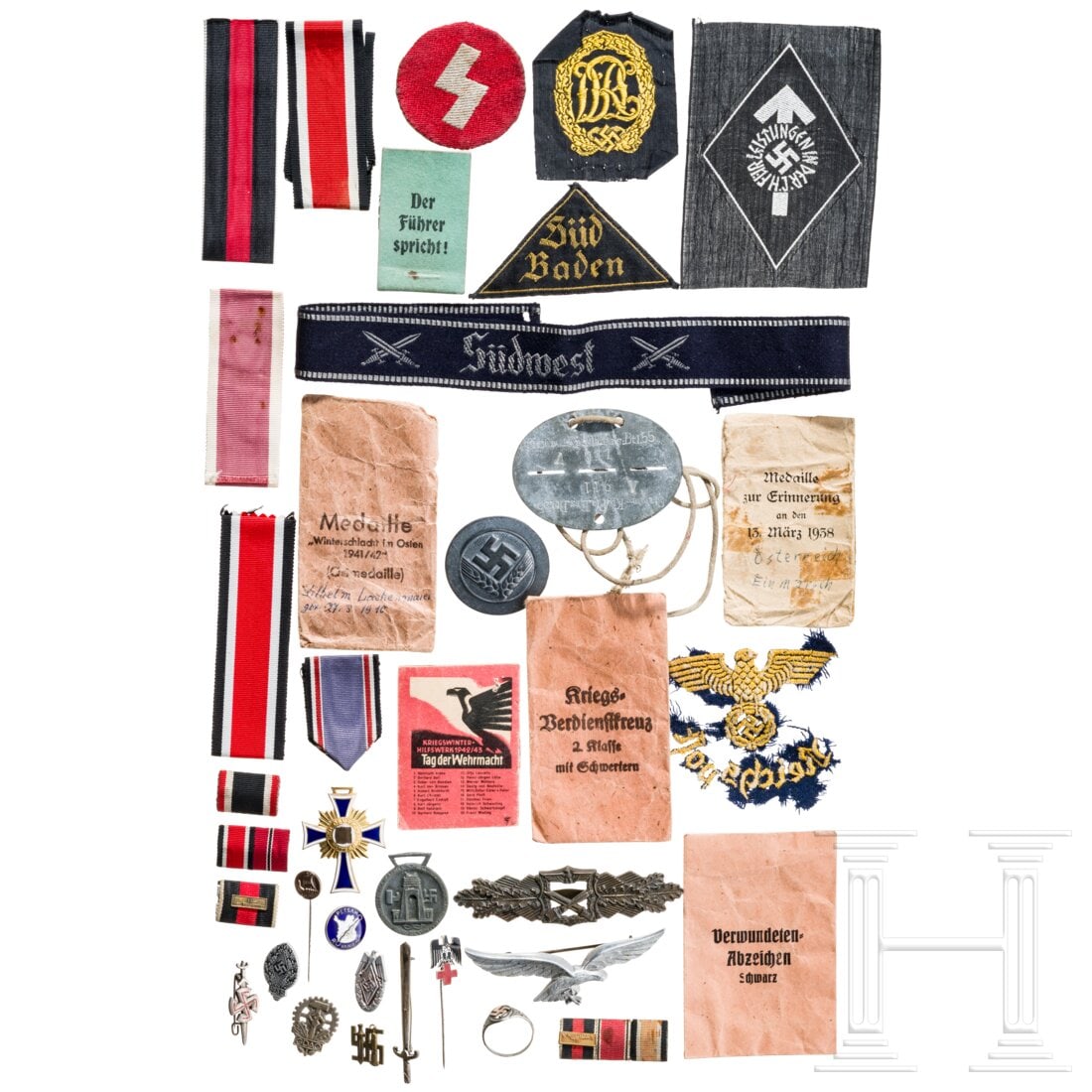 A group of orders and badges: A group of orders and badgesNahkampfspange und Mutterkreuz mit entferntem Hakenkreuz, Deutsch-Italienische Feldzugsmedaille. Ordenstütchen und ca.20 Bänder, teils in der 1957er Ausführung. RAD