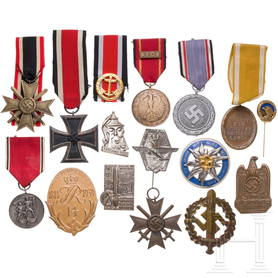 A small group of orders and badges: A small group of orders and badgesEK 2 1939, zwei KVK 2. Klasse mit Schwertern, Schutzwallmedaille, SA-Sportabzeichen in Bronze, Luftschutz-Ehrenzeichen 2.Stufe, Tagungsabzeichen RPT Nürnberg 1933
