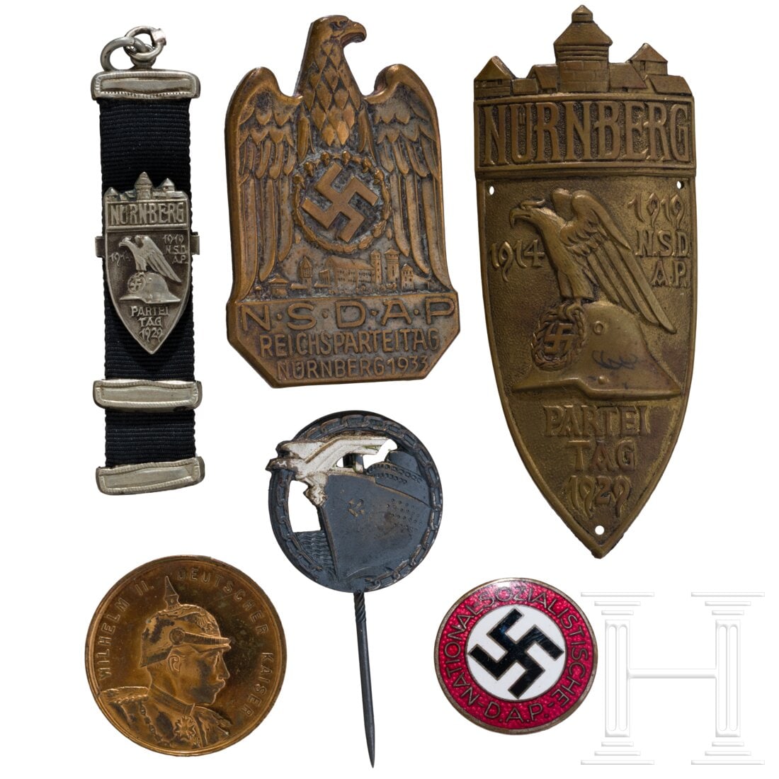 A small group of badges from the Nuremberg Party Rallies of 1929 and 1933 (1 of 2)