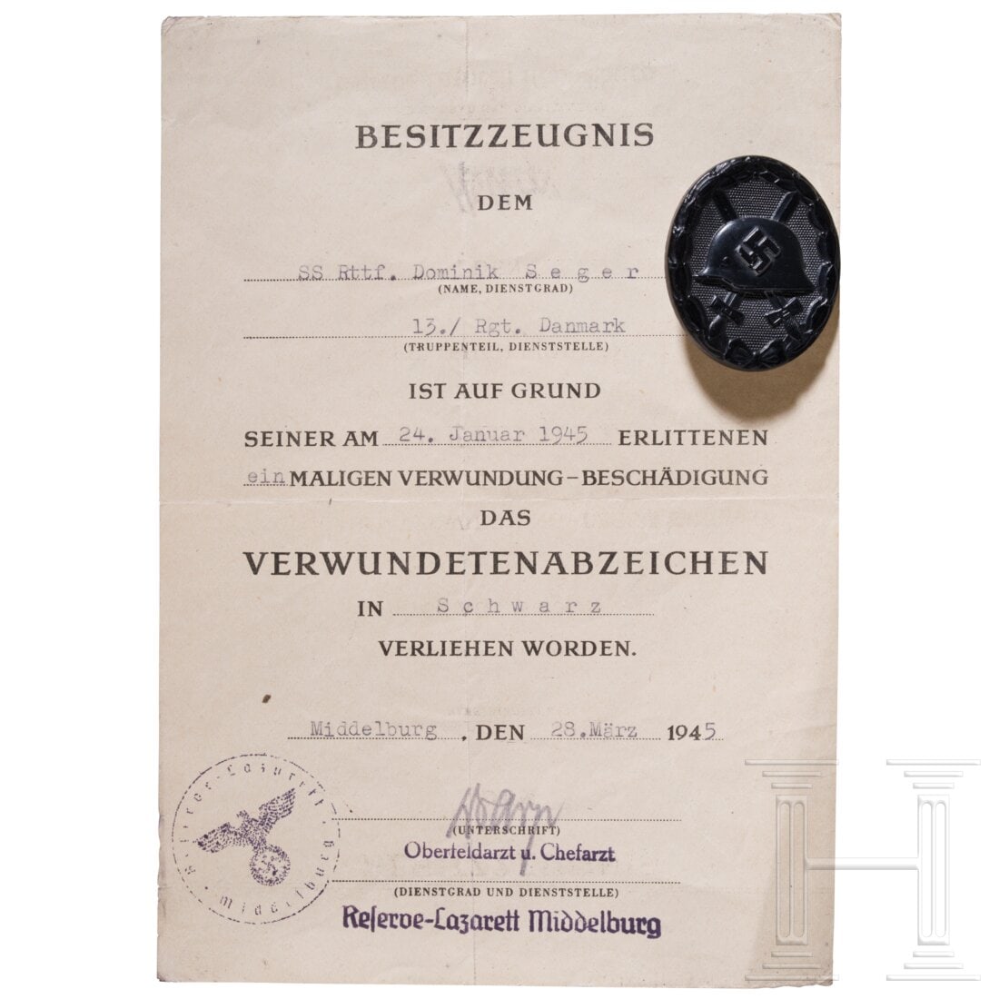 A certificate to the Black Wound Badge for a Rottenführer in the “Danmark?? regiment: A certificate to the Black Wound Badge for a Rottenführer in the “Danmark” regimentUrkunde vom 28.03.45, ausgestellt im Reserve-Lazarett Middleburg mit Unterschrift des Chefarztes. Gefaltet. 