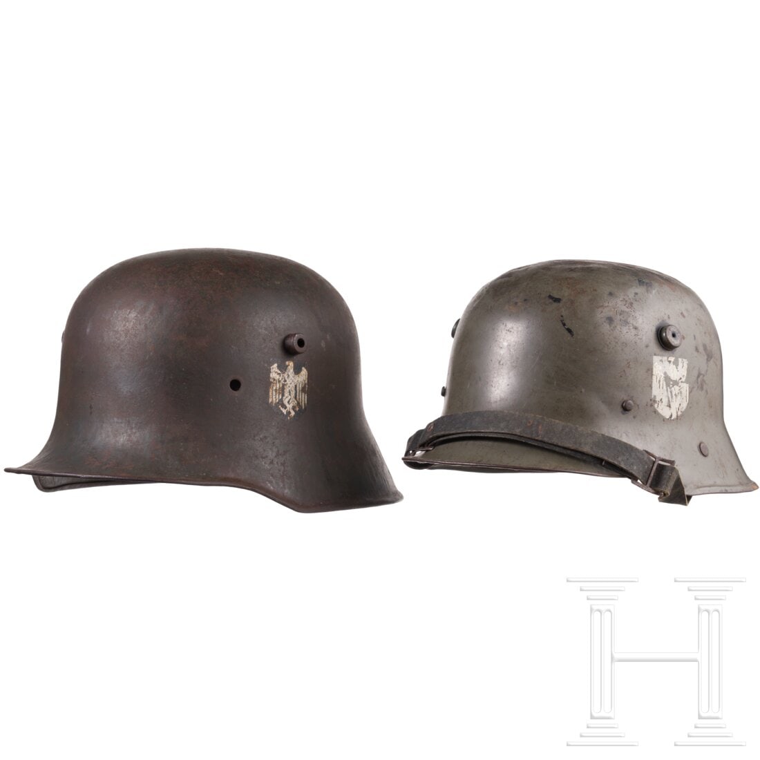 A M18 single decal steel helmet, and a steel helmet for children: A M18 single decal steel helmet, and a steel helmet for childrenStahlhelm M 18 für Angehörige der Wehrmacht, orig. feldgraue Lackierung, das Helmabzeichen (Adler) zu ca. 90% erhalten, ohne Innenfutt