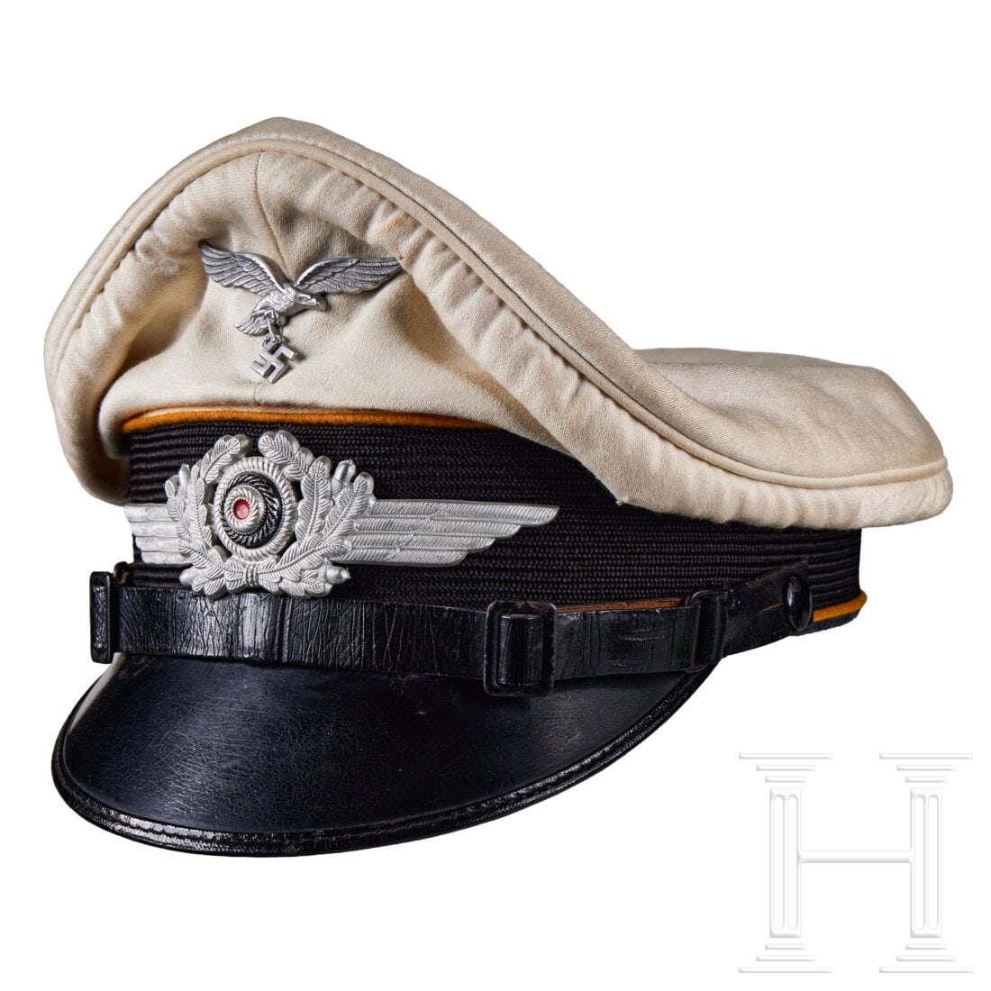 A Summer Visor Cap for Luftwaffe Signal Enlisted/NCO: A Summer Visor Cap for Luftwaffe Signal Enlisted/NCORemovable cap body in white cotton exhibits light soiling. Black mohair cap band, brown piping, black leather chinstrap with metal buckles attached 