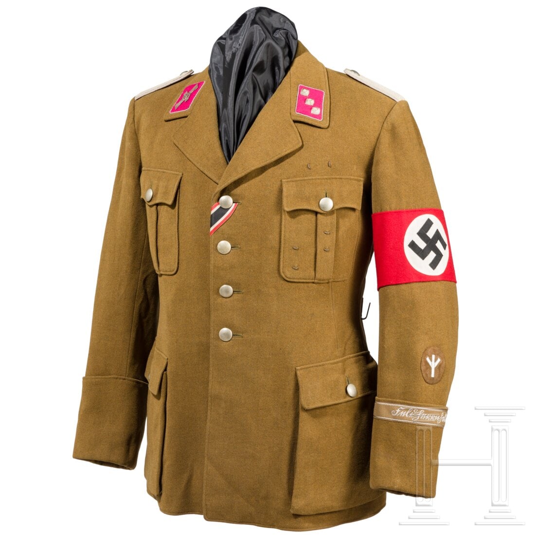 An SA service tunic for an SA Sturmführer and medical doctor of the SA Standarte „Feldherrnhalle: An SA service tunic for an SA Sturmführer and medical doctor of the SA Standarte „FeldherrnhalleElegant, privately purchased item in brown gabardine, produced circa 1940. Crimson collar patches wit