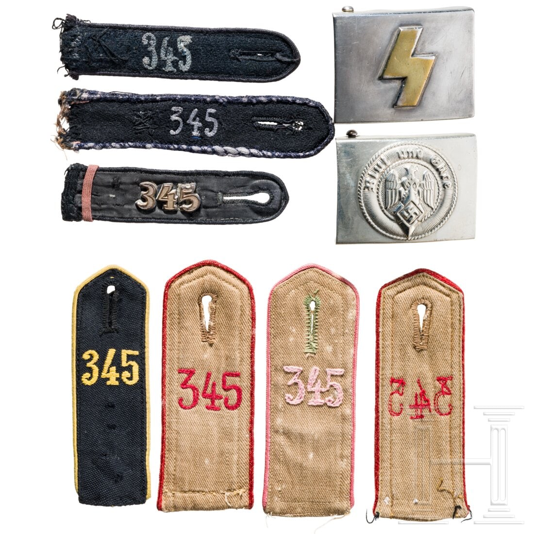 A small group of HJ Insignia: A small group of HJ InsigniaJeweils mit der Bann-Nummer 345 (= Amberg, Bay. Ostmark). Ein Paar Schulterklappen in der frühen Form, braun mit roter Paspelierung und Nummer, sowie ein Einzelstück mit 