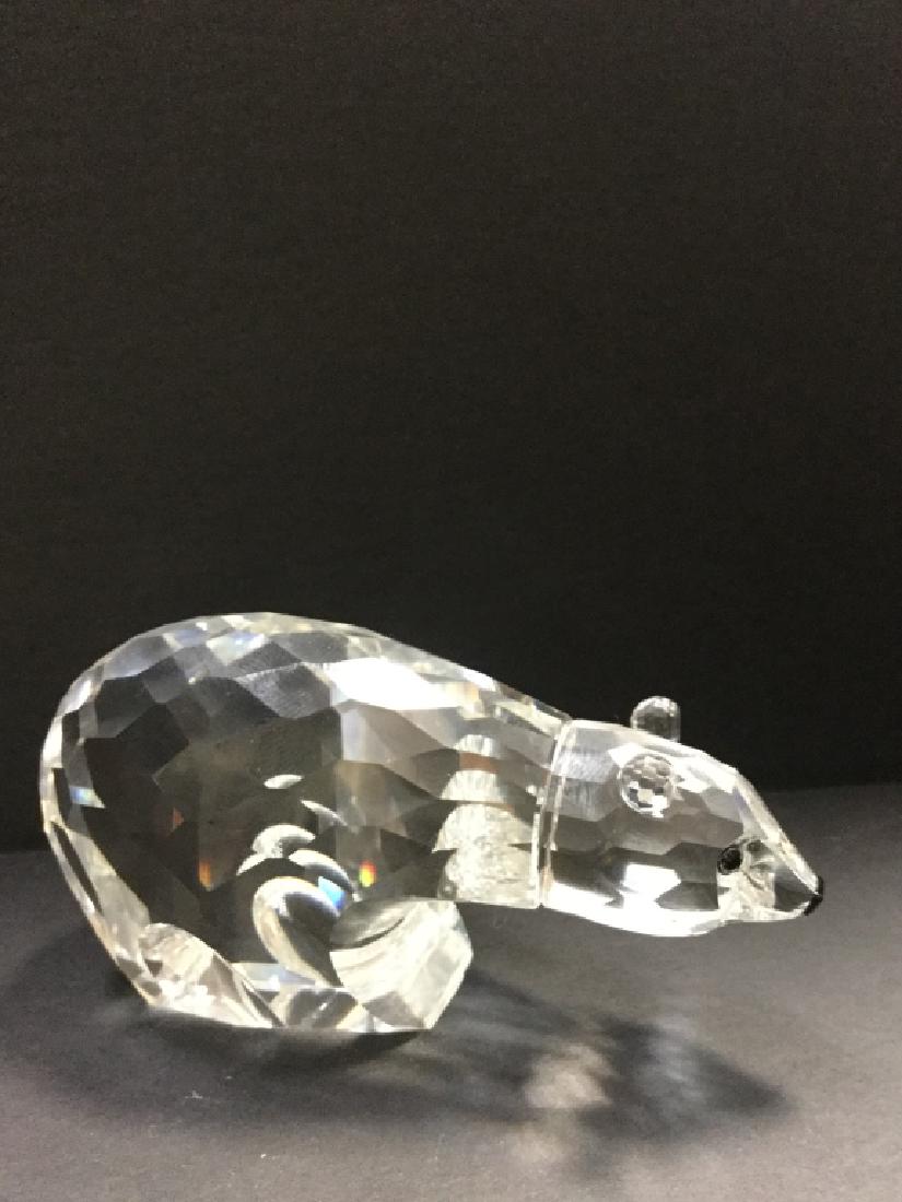 Swarovski Polar Bear- Retired: Swarovski faceted clear crystal polar bear from the kingdom of ice and snow theme, retired in 1997. Measuring 2"H x 3.5"W x 1.5"D
