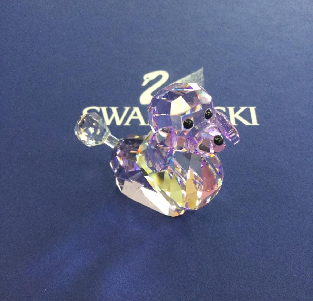 SWAROVSKI LOVLOTS LIMITED EDITION POODLE: Swarovski code numbers: 935 719 / 935719 / 9100 000 111Fashion conscious and always in, this cute poodle comes as a Limited Edition piece. The only lady in the Gang of Dogs, she is made from fully fac