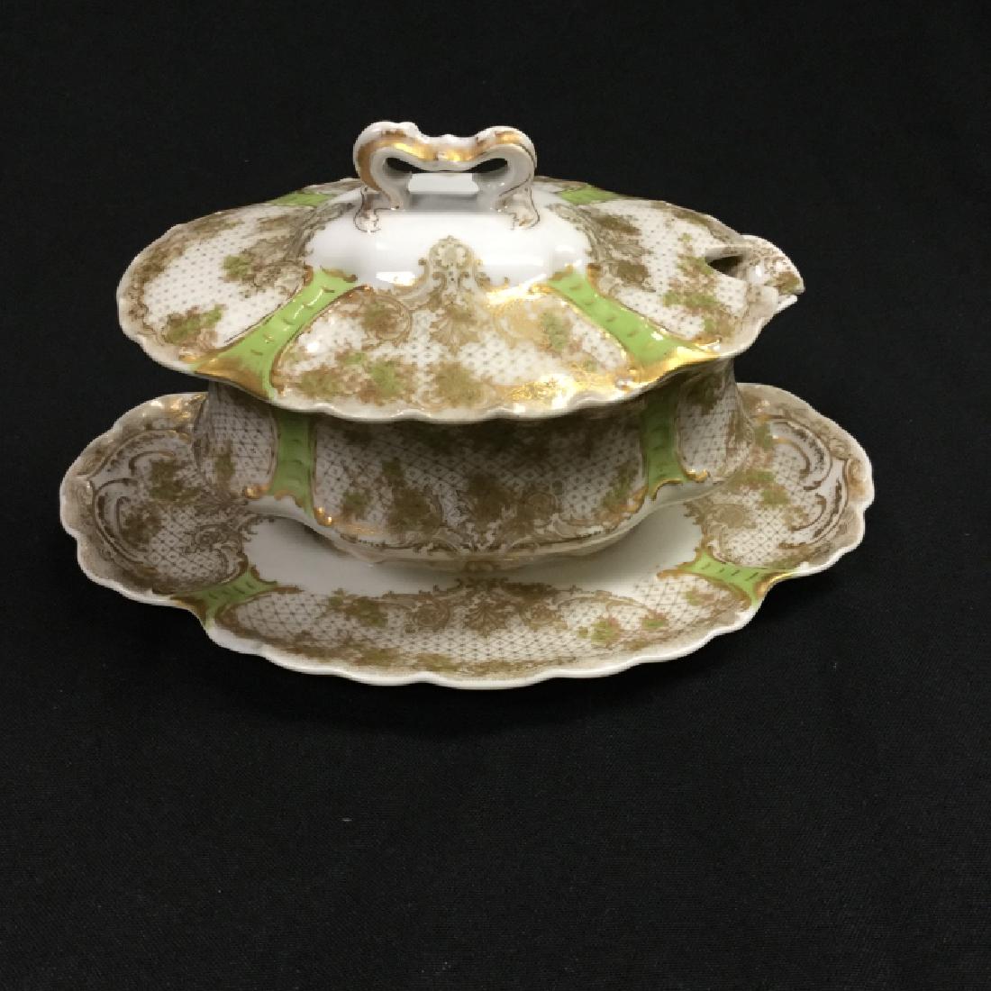 Haviland Limoge China Gravy Boat: Antique Limoge Haviland China with Green Panels & Roses Motiff. This is a discontinued pattern. The story of Haviland begins in 1841, when David Haviland left New York and headed to Limoges, a French