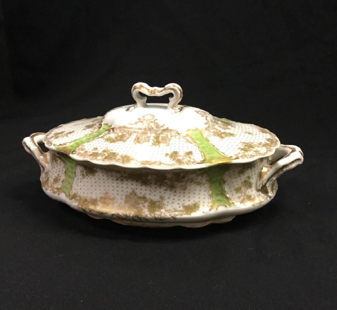 Haviland Limoge Serving Bowl with Lid: Antique Limoge Haviland China with Green Panels & Roses Motiff. This is a discontinued pattern. The story of Haviland begins in 1841, when David Haviland left New York and headed to Limoges, a French