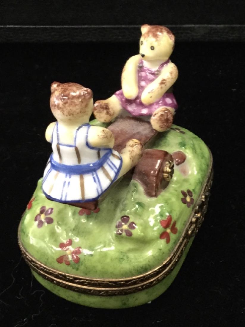 Limoges France Two Bears on a Seasaw Pill Box: "Adorable girl bears on a seasaw. Limogers France Marque DeposePeint MainEdition A9990234/25002 1/4"" H"U.S. Shipping available $10