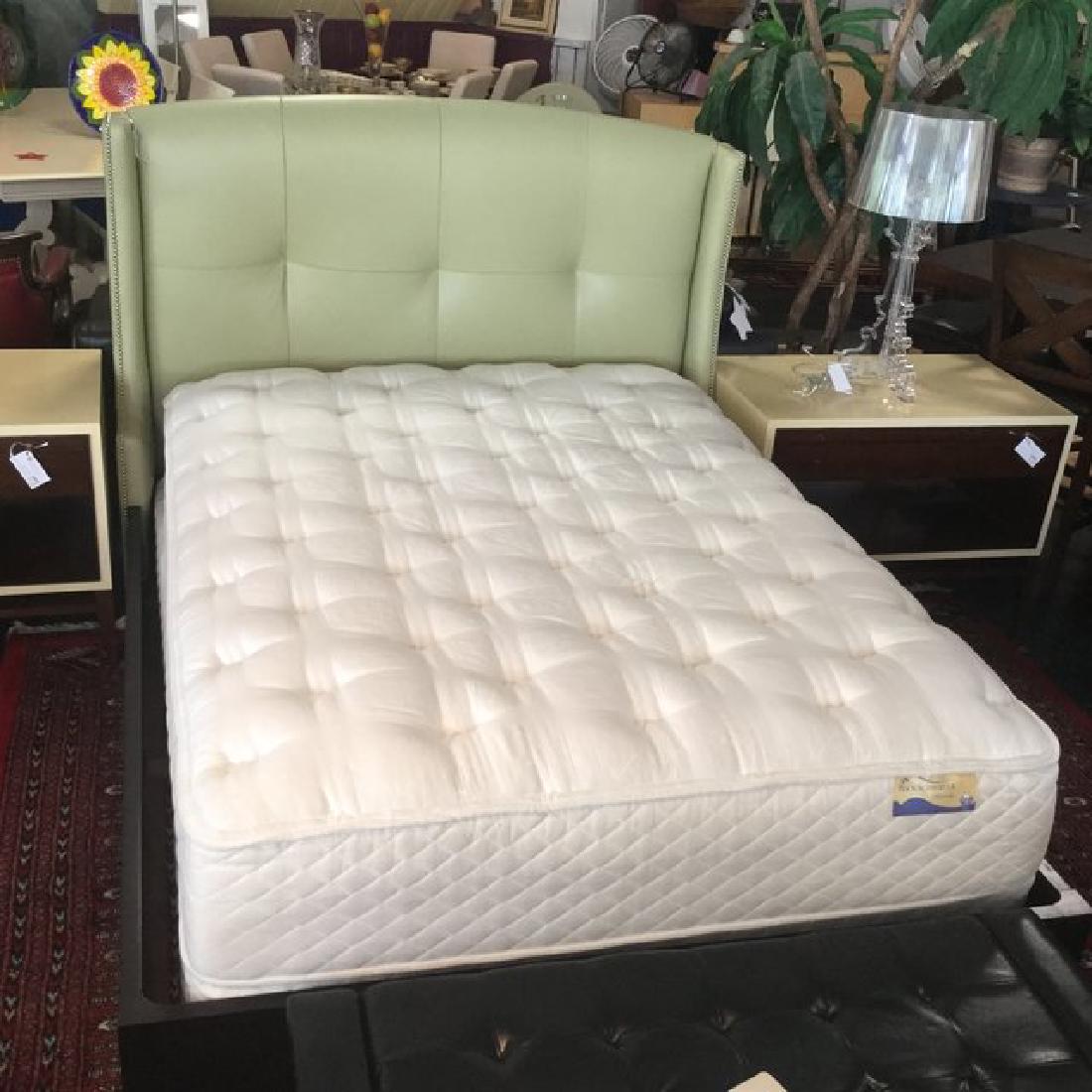 Modern Pistachio Leather Leather Bed: Modern Tufted green leather bed in great condition.DETAILSDimensions62"W × 87"L × 53"HLike New Condition